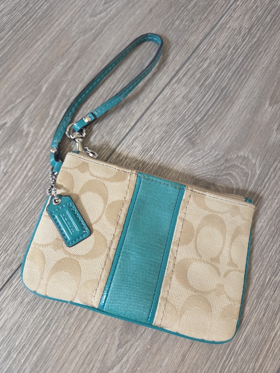 Coach Handbags - Coach Beige and Teal Signature Wristlet Clutch